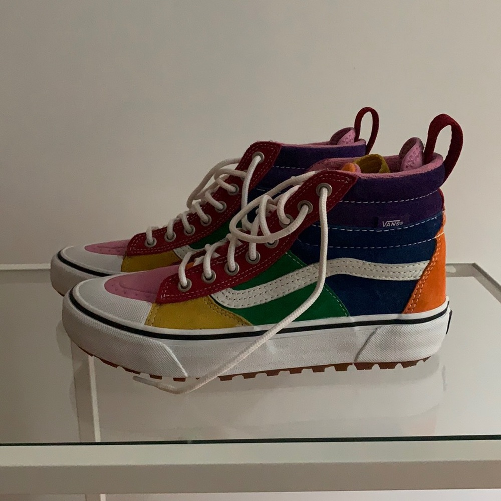 Multi-Colored high top vans. Great to pair with basic outfits!